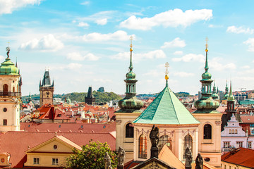 Prague, Bohemia, Czech Republic. Cityscape of Praha with dome, houses, churches, tower.