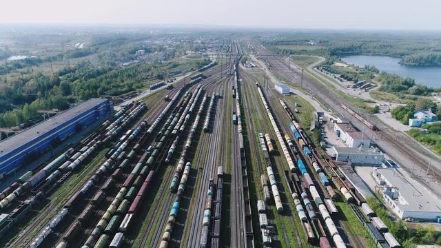 Logistics concept. many ways, freight trains re sorting. industrial railway landscape. Railroad tracks. Top view shooting with quadrocopter.