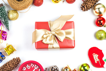 Christmas background with a red ornament, gift box,