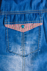 Blue washed faded jeans texture with seams, clasps, buttons and rivets