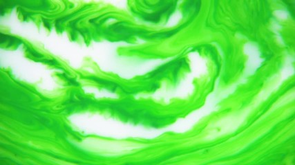 The green color curly and swirls flows into the white background