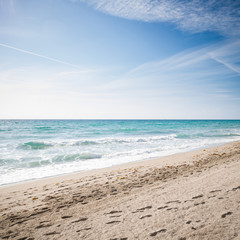 Empty sandy beach near the ocean. Miami Beach, Florida. Seaside. Early morning.