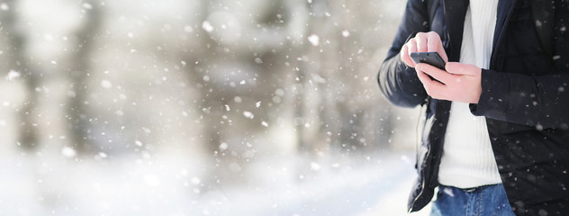 A man with a backpack frosty winter