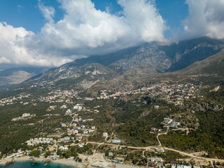 Aerial view of Dhermi and Albanian mountains in Albanian Riviera (Albania)