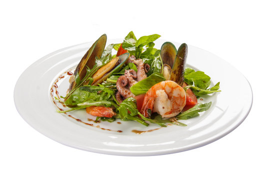 Seafood salad. A traditional Spanish dish. On a white background