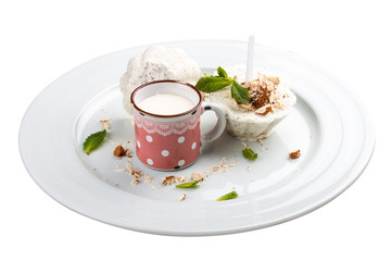 Mint ice cream with almonds. On a white background