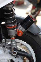 Rear shock absorber scooter. Scooter racing. Details of motor technics
