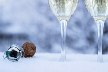 glass of champagne on on winter background
