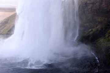 Behind a waterfall 