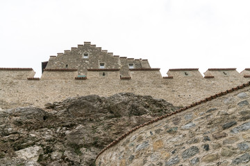 Schaffhausen, SH / Switzerland - November 10, 2018: frog perspective of architectural detail of the historic landmark Schloss Laufen castle at Rhine Falls in Schaffhausen in Switzerland