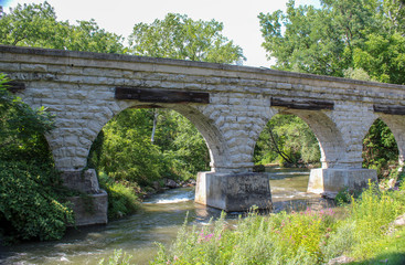5 Arch Bridge in Avon, NY. Built by the Genesee Valley RR, the historic bridge spans the Conesus outlet