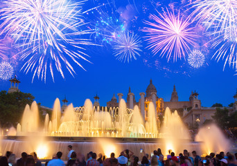 Fototapeta na wymiar Magic Fountain and National museum at night with fireworks, Barcelona, Spain