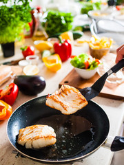 Fried fish in pan