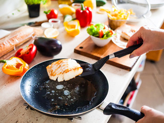 Fried fish in pan