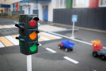 Traffic lights, cars and pedestrian crossing