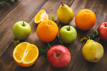 Table of dark colour and juicy delicious fruits