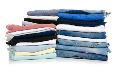A stack of clothes jeans t-shirt shirt on a white background. Isolation