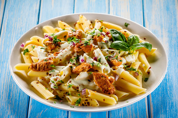 Pasta carbonara and vegetables