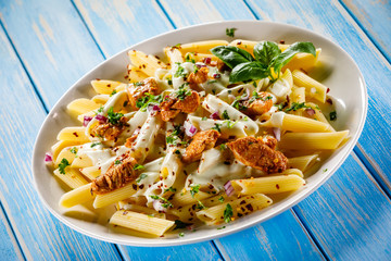 Pasta carbonara and vegetables