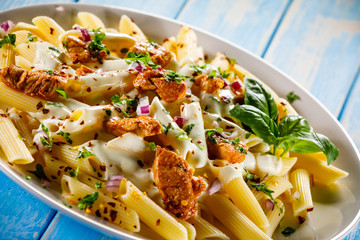 Pasta carbonara and vegetables