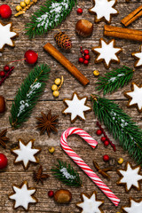 Christmas Background with Holiday Star Gingerbread Cookies Decorations on Wooden Background. Selective focus.