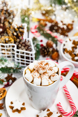 Christmas and New Year Background Breakfast with Croissants and Hot Cocoa with Marshmallows. Selective focus.