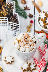 Christmas and New Year Background Breakfast with Croissants and Hot Cocoa with Marshmallows. Selective focus.
