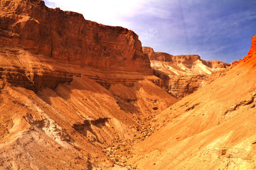 Scenic view of Masada mount in Judean desert near Dead Sea, Israel. Snake Path, favorite tourist hiking destination in Israel, great way to visit Herod's mountain palace, Masada, Israel