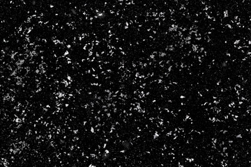 Snow on a black background.