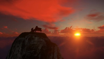 Afro american piano player performing on top of a mountain above clouds against beautiful sunset, drone view 4K