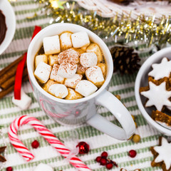 Christmas and New Year Background Breakfast with Croissants and Hot Cocoa with Marshmallows. Selective focus.