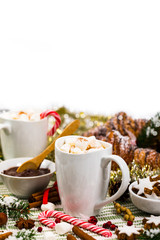 Christmas and New Year Card Background with Hot Cocoa with Marshmallows on white background with Space for Text. Selective focus.