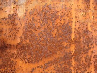 Grunge rusted metal texture. Rusty corrosion and oxidized background. Worn metallic iron panel.