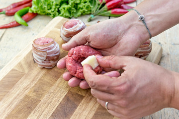 Preparation of meatballs stuffed with cheese