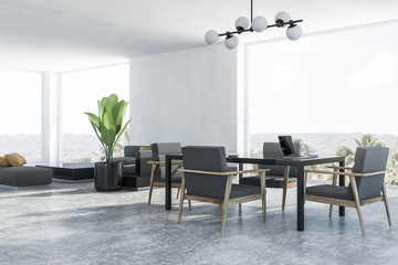 White dining room corner, gray armchairs