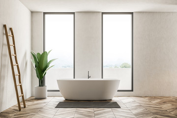 Fototapeta na wymiar White bathroom interior with tub and ladder