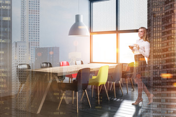 Brick and gray dining room corner, woman