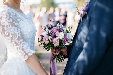 wedding bouquet in bride's hands