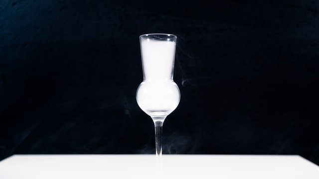 schnaps glass full of smoke, shot glas filled with smoke