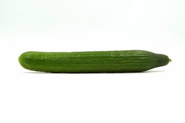 Green cucumber against a white background.
