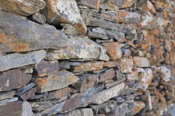 Wall from rock stones