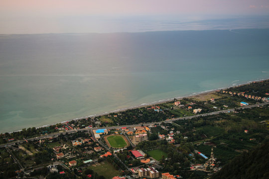 View of the Caspian Sea and city at sunset in the city of Ramsar, northern Iran