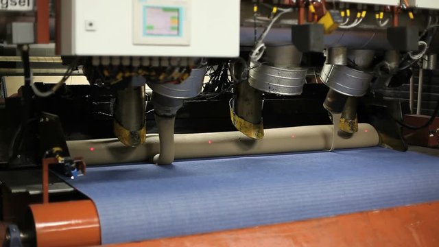 making tapestry in factory with glue and machine