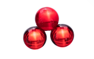 Small red medicine capsules containing nitroglycerin, validol