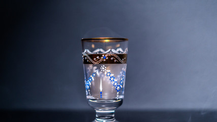 goblet glass full of smoke, goblet glas filled with smoke, smoke inside a glas