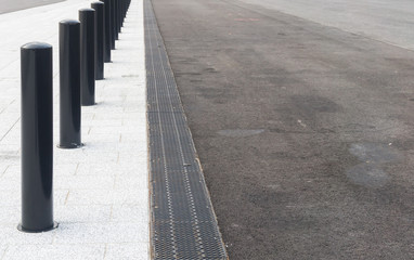Pedestrian and driving roads with dividers and drainage