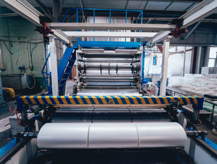 Modern automated production line in factory. Plastic bag manufacturing process