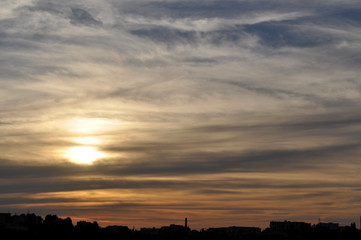 Fototapeta premium Magical view of gorgeous sunset over cityscape