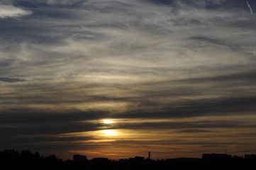 Fototapeta premium Magical view of gorgeous sunset over cityscape
