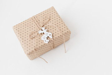 Wrapped present on textured white background